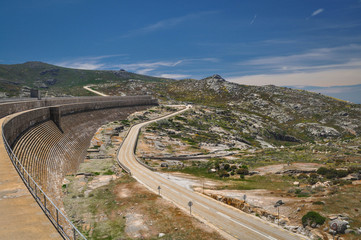 Concrete Dam in the mountains near the road