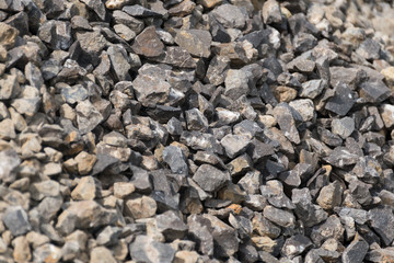 Background with gray stones. Stone for construction. Building material. Rock texture background.