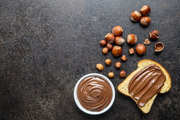 Toast bread with hazelnut spread. Sweet chocolate cream.