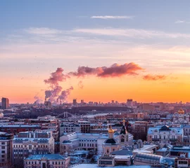 Foto op Canvas cityscape at sunset. Smoke from the pipes. Gorky park from the observation deck of the Cathedral of Christ the Savior. © mazurevanasta