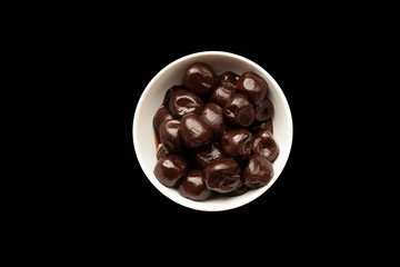 preserved cherries in a white dish
