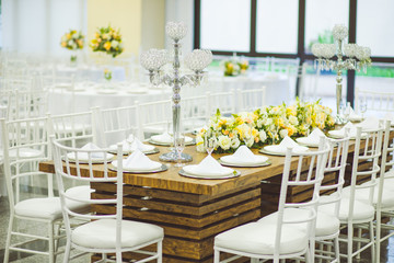 community table decorated with flowers for buffet 