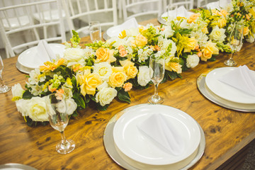 community table decorated with flowers for buffet 