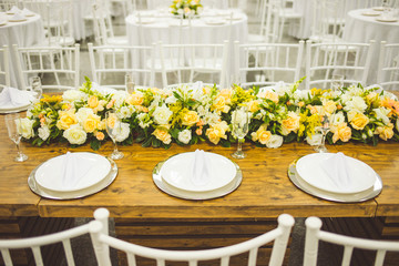 community table decorated with flowers for buffet 