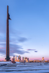 Naklejka premium Winners Square in Victory Park on Poklonnaya Hill in winter sunset. Monument, Obelisk of Victory. George the Victorious.Moscow City