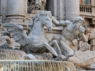 Detail of Fontana di Trevi, Trevi Fountain: Triton and a seahorse. Rome, Italy
