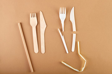 Disposable tableware made of environmental materials. Eco-friendly cookware, zero waste production from recycled materials. Paper plates, glasses, cocktail tubes. Wooden forks and knives. 