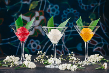 Martini glasses with scoops of ice cream