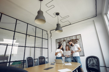 Students create a new project. Team working in a office
