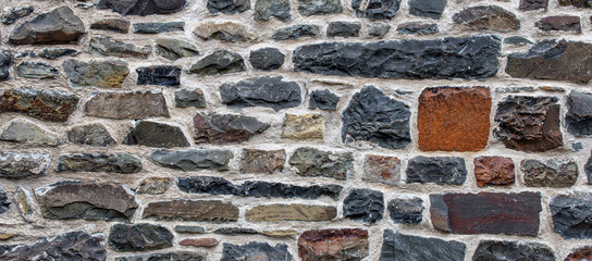 texture of old stone wall - rock bricks background