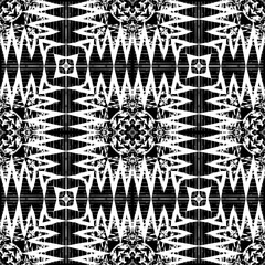 Zigzag tribal black and white geometric seamless pattern. Vector ethnic style textured background. Grunge abstract zigzag ornament. Geometry shapes, zigzag lines, stripes. Rough dirty grungy texture