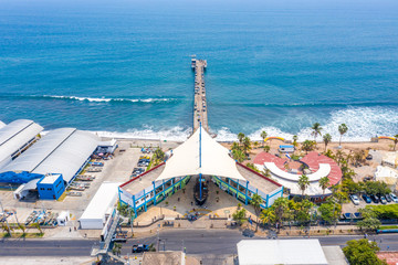 Aerial view over the coastal area on La Libertad beach in El Salvador, where you can see in its...