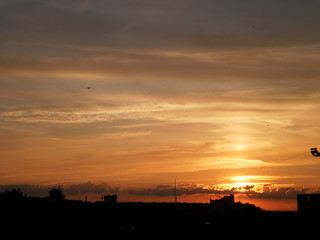 Fototapeta na wymiar sunset over the town