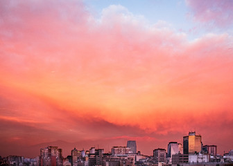 Obraz premium Orange Clouds at sunset over the Pre-Andes Mountains