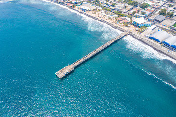 Aerial view over the coastal area on La Libertad beach in El Salvador, where you can see in its...