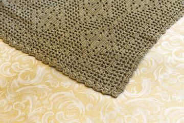Handmade crochet cloth mesh pattern texture.