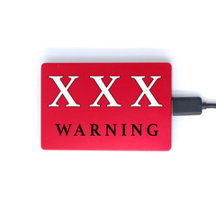 Top view warning symbol of Red External hard disk drive of the computer for storage document and...