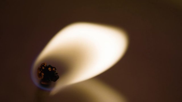 Candlelight Burning. Closeup Footage Of Light And Candle. Video In 4K And HD. Download The Candlelight Video Preview For Free.