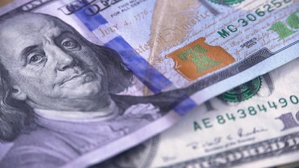 Counting Four Hundred Dollars Banknotes