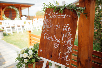 Wooden board with welcome sign. Celebration can start