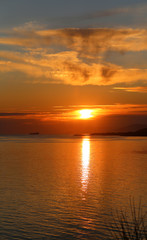 Fototapeta na wymiar Photo of a beautiful sunset on the sea