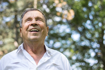 Portrait of a smiling senior man in Nature 