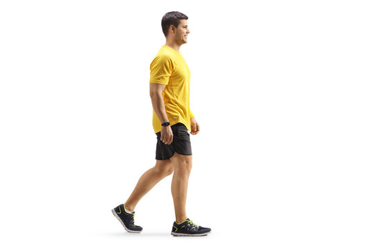Full length profile shot of a man in sportswear walking