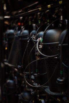 Parabolic Reflector Lights In A Row On Shelf