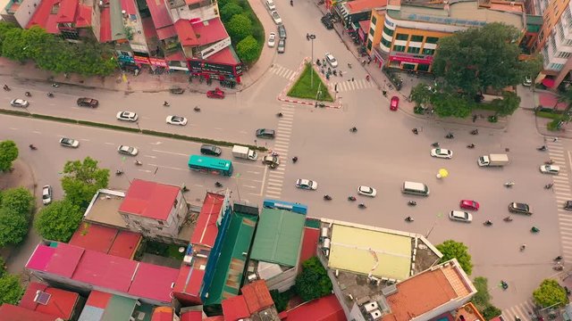 HANOI, VIETNAM - APRIL, 2020: Aerial panorama view of the roofs of houses and crossroad of the city of Hanoi.