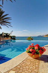 Fototapeta na wymiar View of the pool and the Mediterranean Sea - Italy