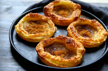 Puff pastry with coconut and cinnamon. Sweets.