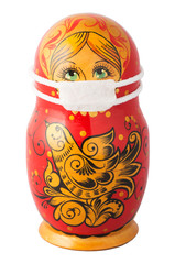 russian nesting doll with medical mask like covid-19 symbol