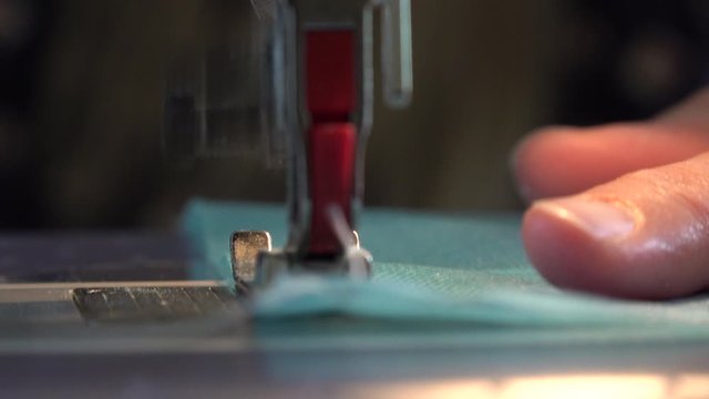 Close Up of Sewing Machine as Person Sews