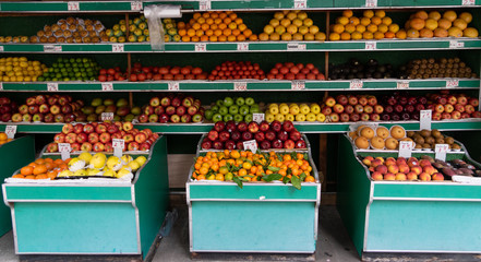 fruits in street market. Apples, oranges, pears, peaches, tangerines