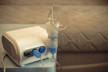 Nebulizer for asthmatics is on the table in the room
