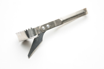 Fish scale scraper on a white background