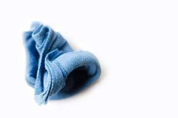 Old dirty torn rag isolated on white background. Cleaning rag.
