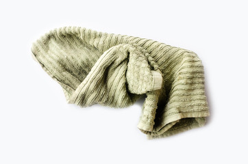 Old dirty torn rag isolated on white background. Cleaning rag.
