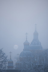 Early morning with rooftops and church towers