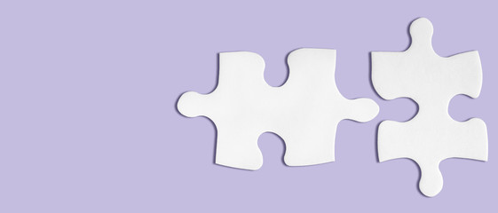 Matching puzzle piece on lilac background. Successful decision, solution of problem. Business success metaphor.