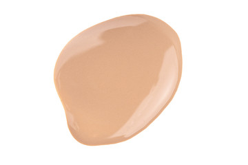 Makeup beige liquid foundation drop swatch. Nude liquid concealer smear smudge isolated on white.
