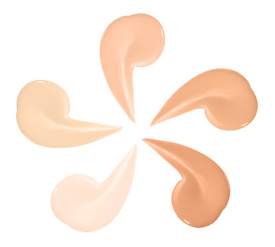 Set of liquid concealer swatch isolated on white. Beige nude foundation drop. Collection of different tones make up cosmetic sample. Makeup cream smudge