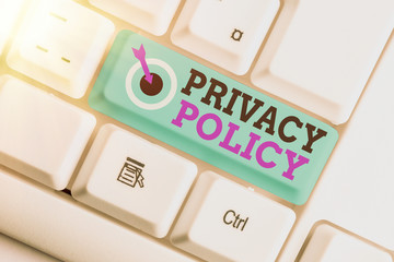 Writing note showing Privacy Policy. Business concept for Document that explains how an organization handles clients