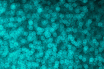 Blurred blue defocused light. Pattern background. Holiday glowing party decoration. Magic illuminated lights.