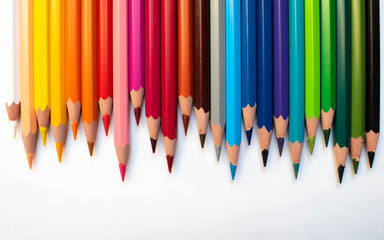 colored pencils on white background