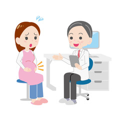 慌てた様子で診察を受ける妊婦