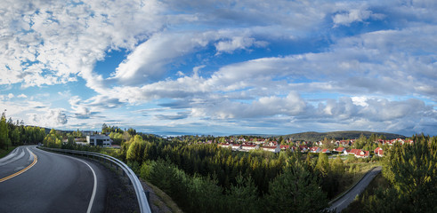City in Norway from a mountain ridge and forest