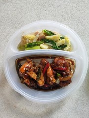 Chicken Black Pepper and Saute Corn for Office Lunch. Selective Focus