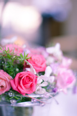 Flower bouquet with a pink rose in focus