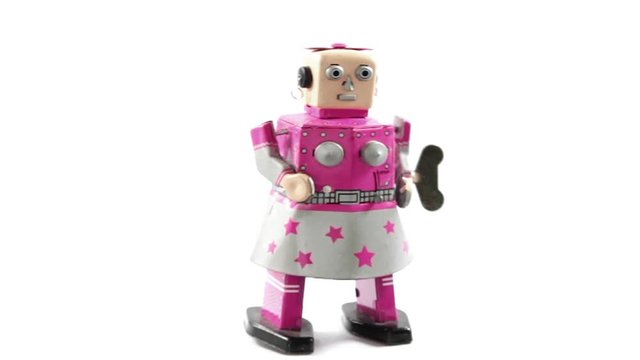 retro pink robot girl walks slowly then falls 